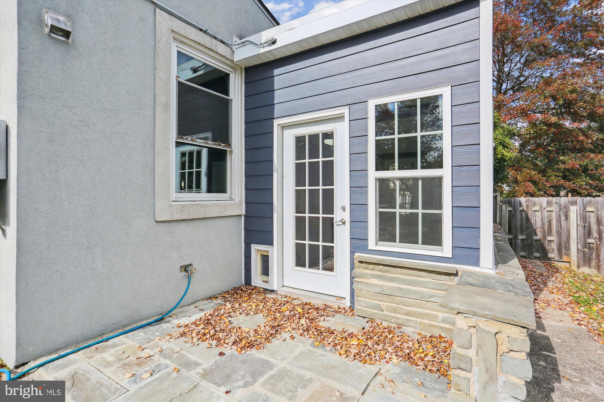 19500 Wootton Avenue Poolesville, MD 20837 - Photo 52 of 62 a front view of a house with a yard