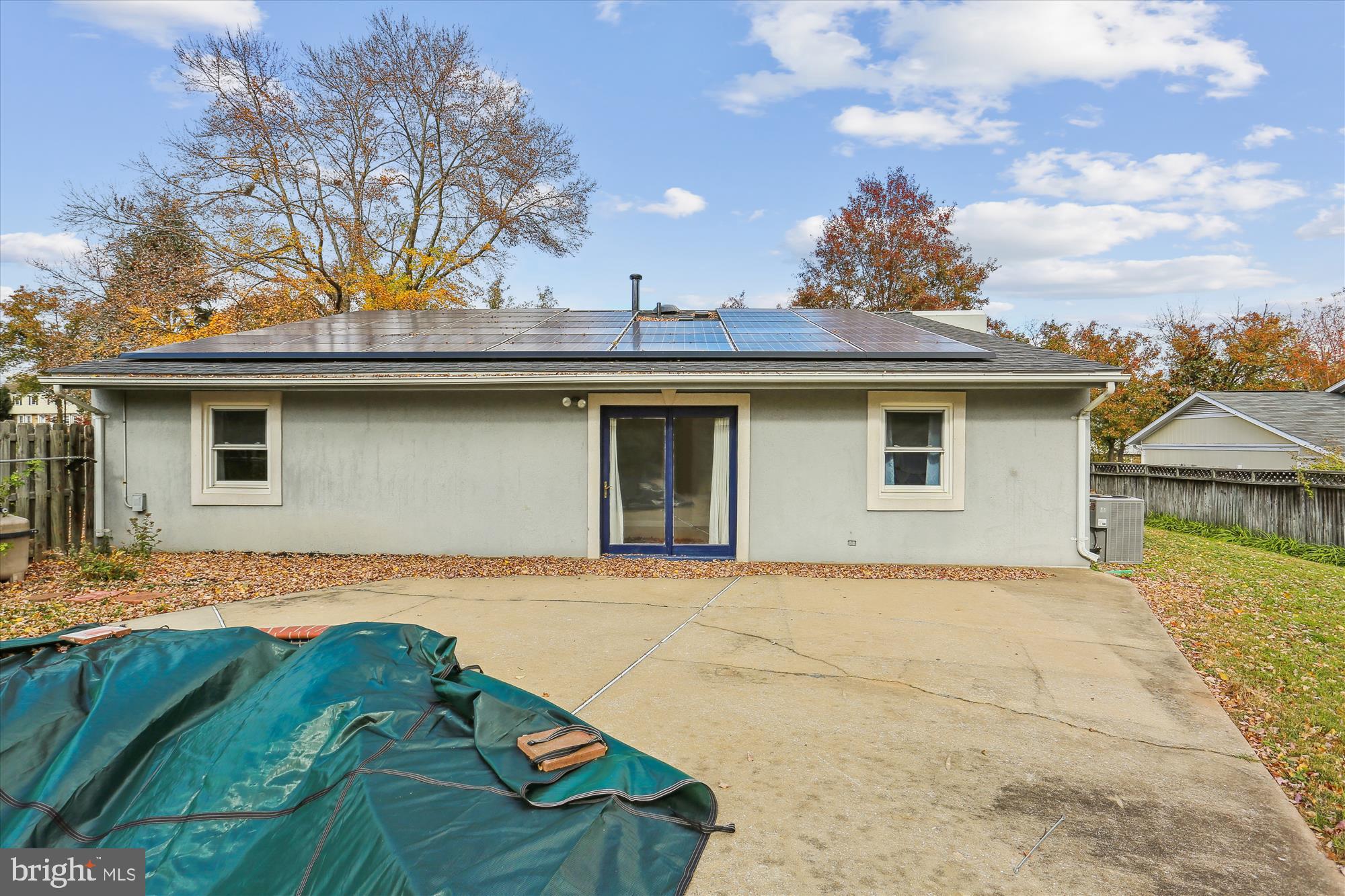19500 Wootton Avenue Poolesville, MD 20837 - Photo 53 of 62 a view of a house with a patio