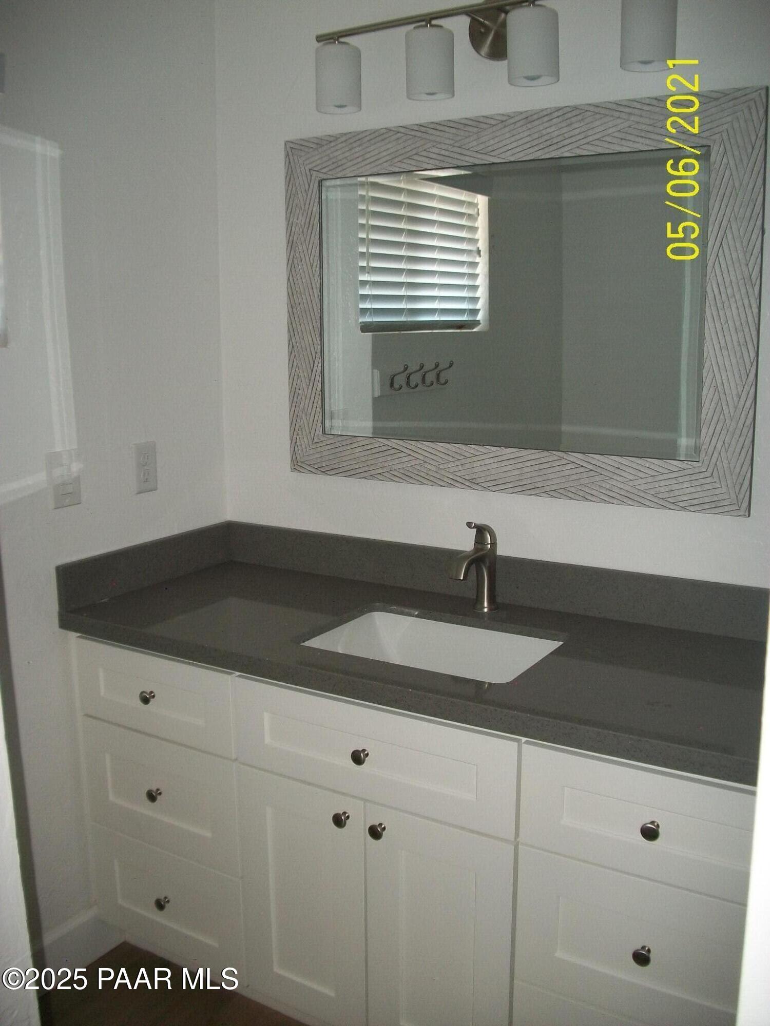 5270 Diamond Drive, Unit B Prescott, AZ 86301 - Photo 11 of 12 a close view of sink and tap