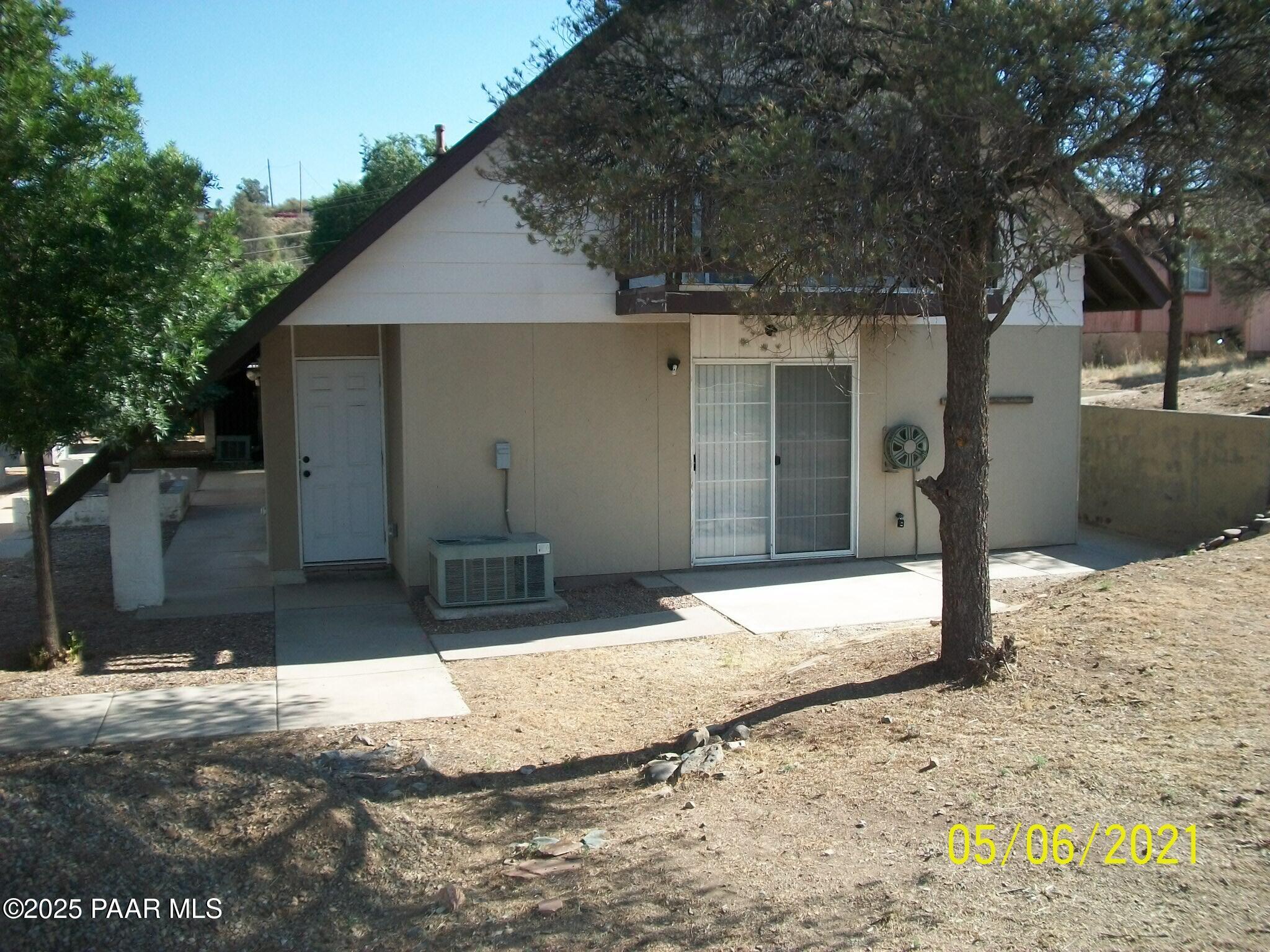 5270 Diamond Drive, Unit B Prescott, AZ 86301 - Photo 12 of 12 a view of a house with snow on the road