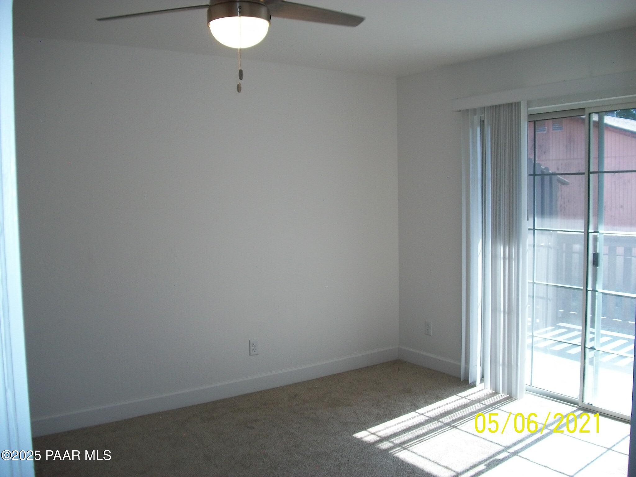 5270 Diamond Drive, Unit B Prescott, AZ 86301 - Photo 8 of 12 a view of an empty room and a window