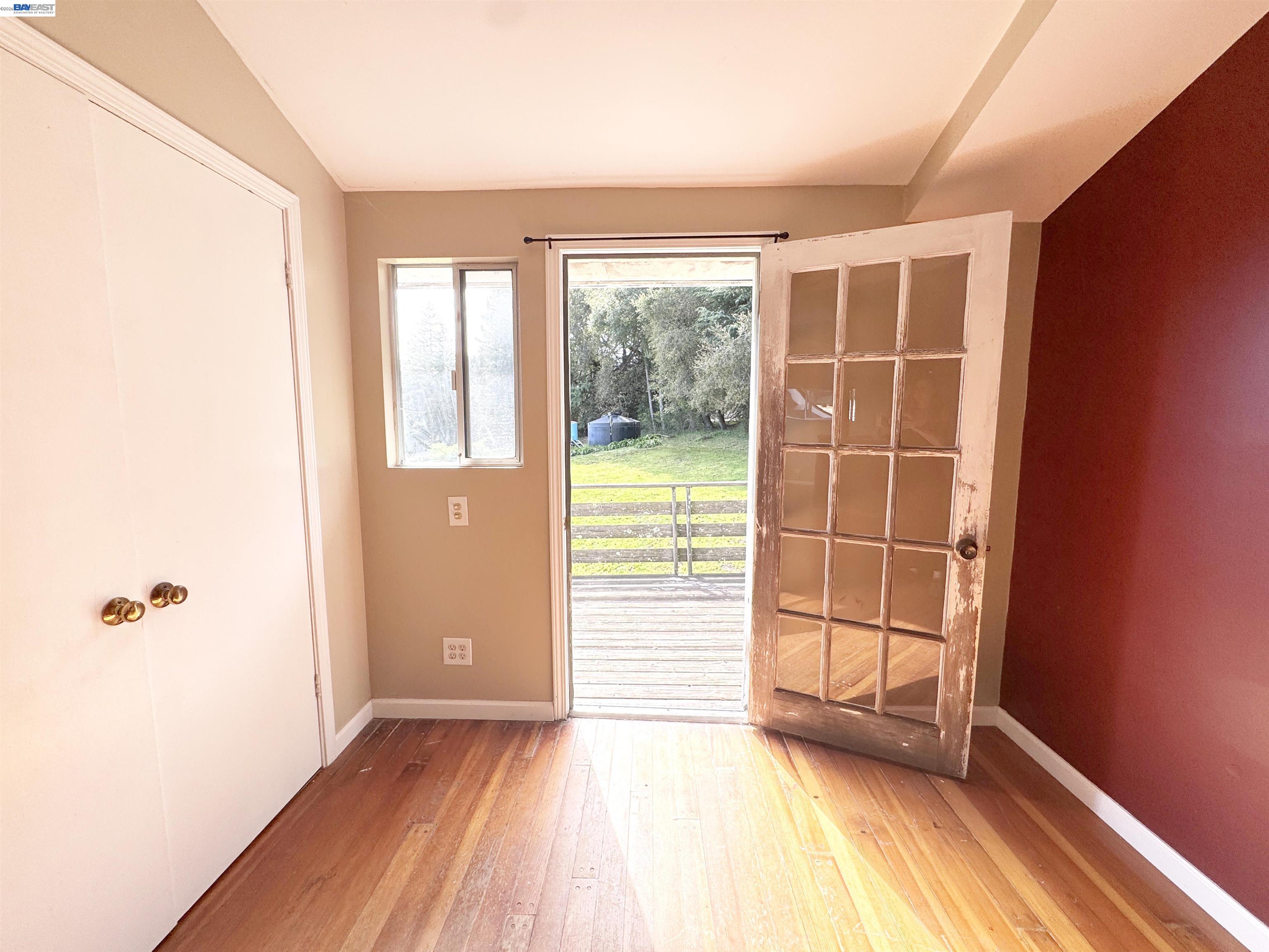 17121 Laurel Road Los Gatos, CA 95033 - Photo 28 of 43 an empty room with windows