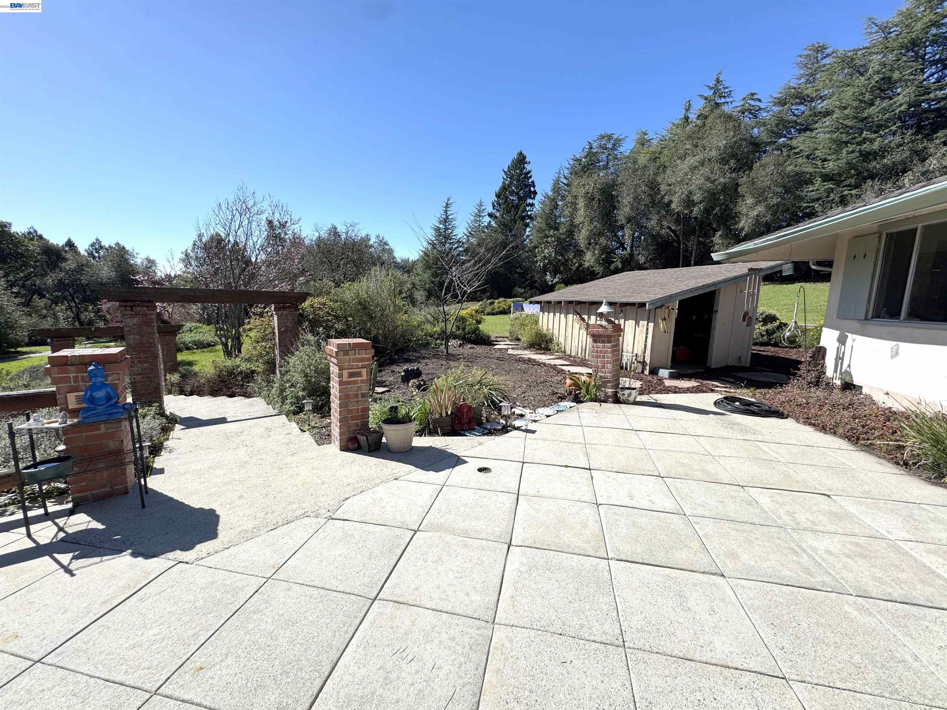 17121 Laurel Road Los Gatos, CA 95033 - Photo 36 of 43 a view of a terrace with trees
