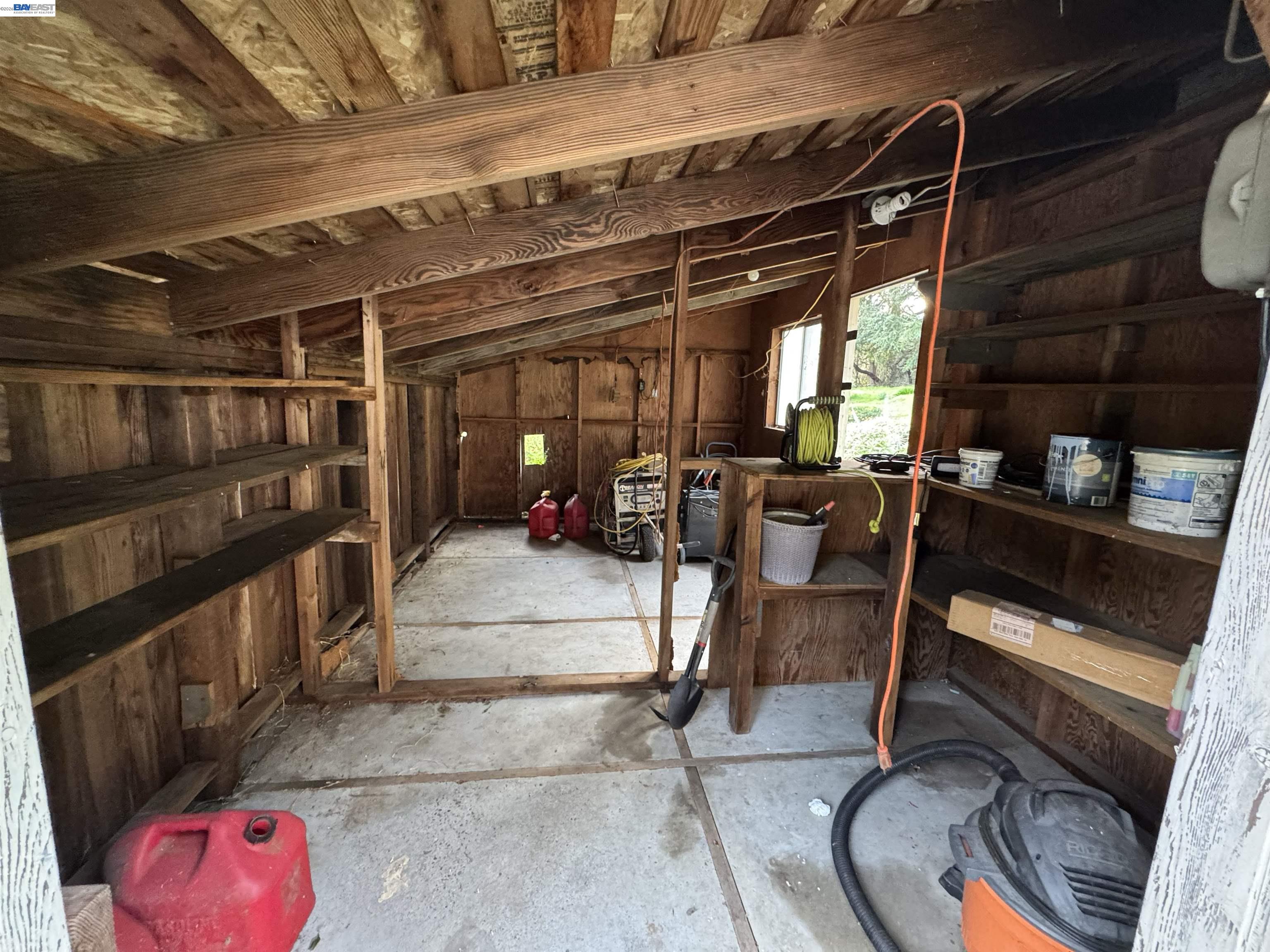17121 Laurel Road Los Gatos, CA 95033 - Photo 39 of 43 a view of a room with wooden floor