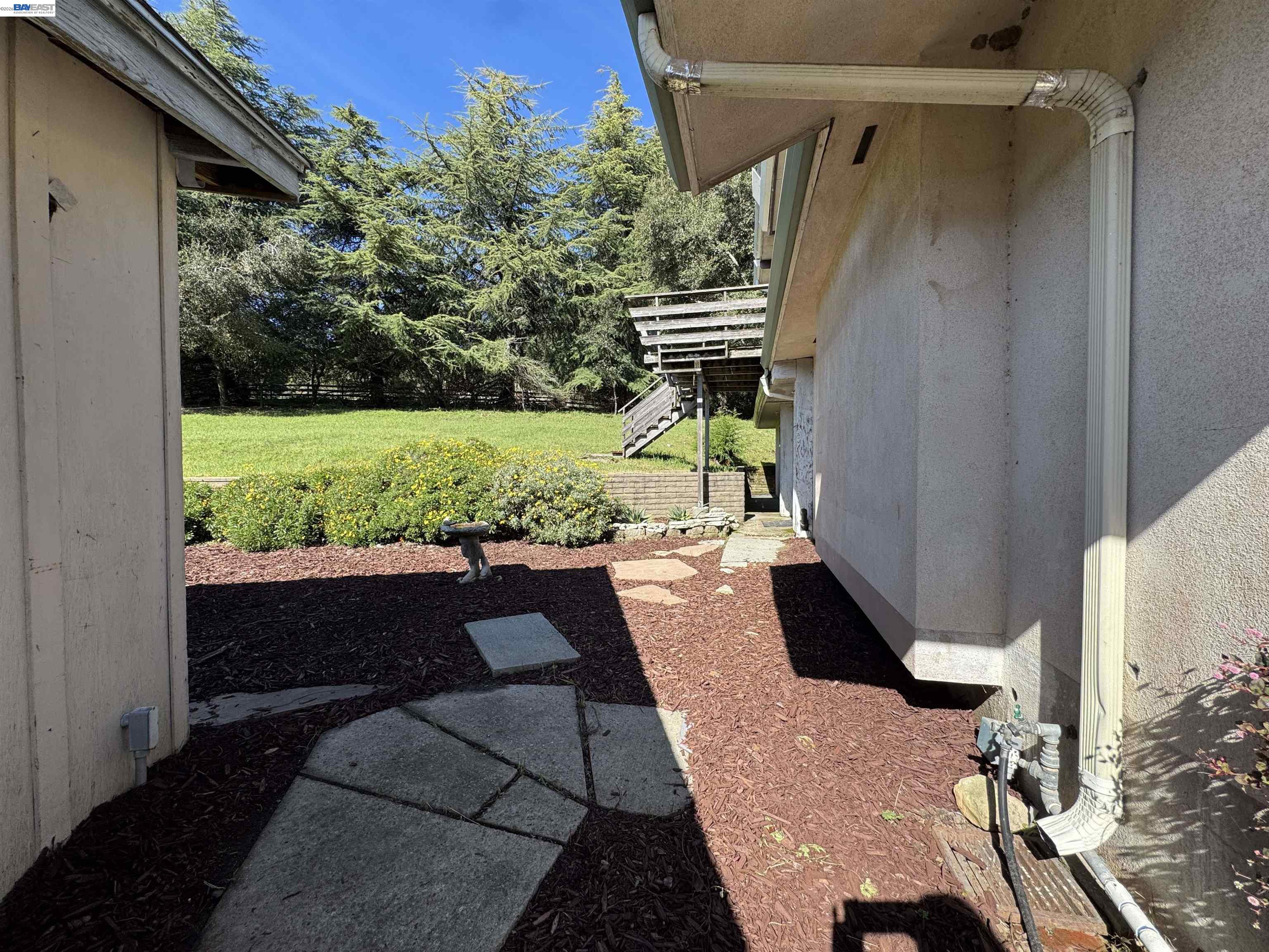 17121 Laurel Road Los Gatos, CA 95033 - Photo 40 of 43 a view of balcony with wooden floor and outdoor seating