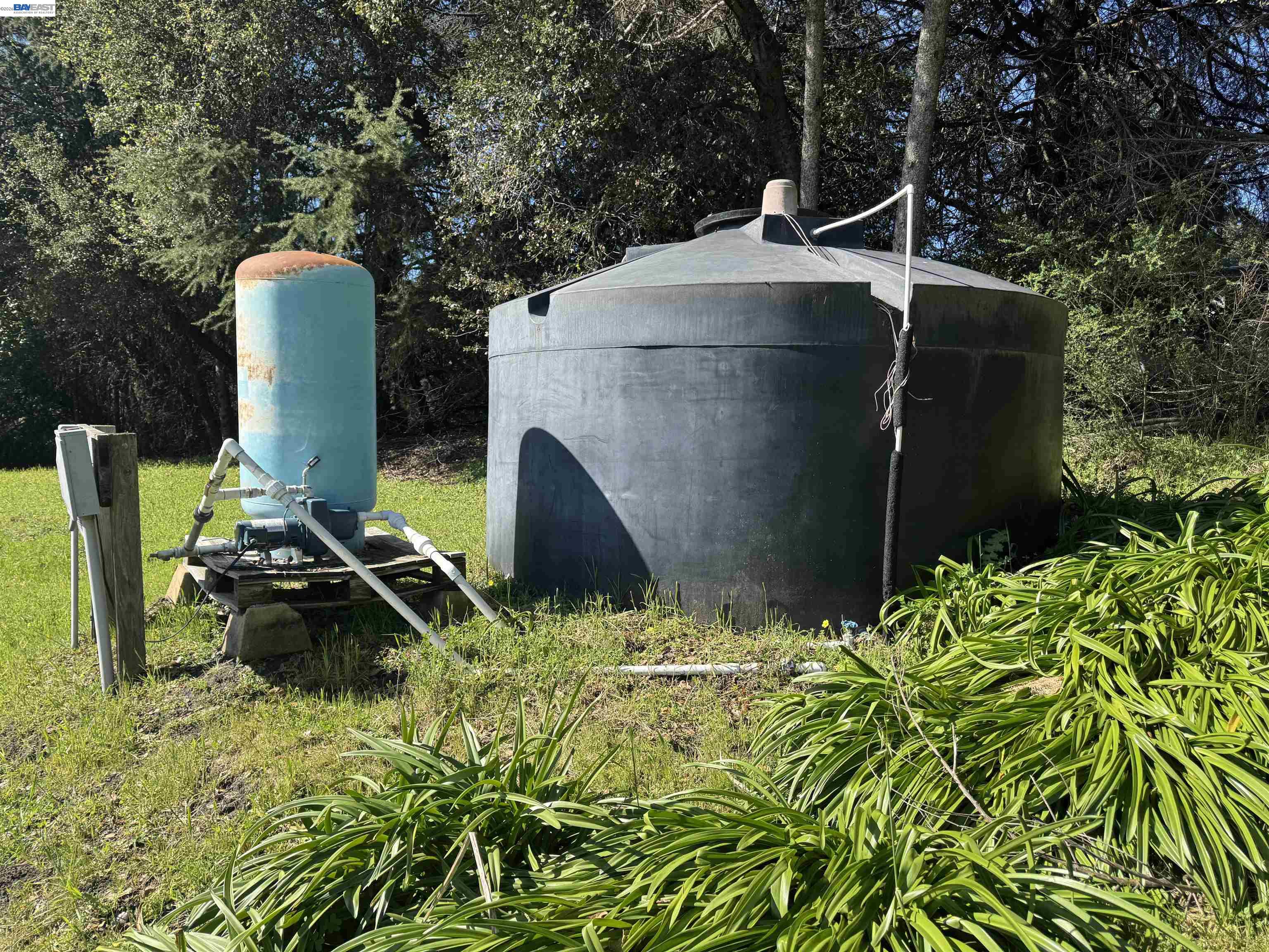 17121 Laurel Road Los Gatos, CA 95033 - Photo 43 of 43 a backyard of a house with table and chairs