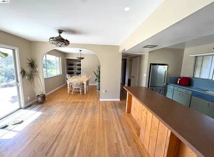 a view of a living room and dining room