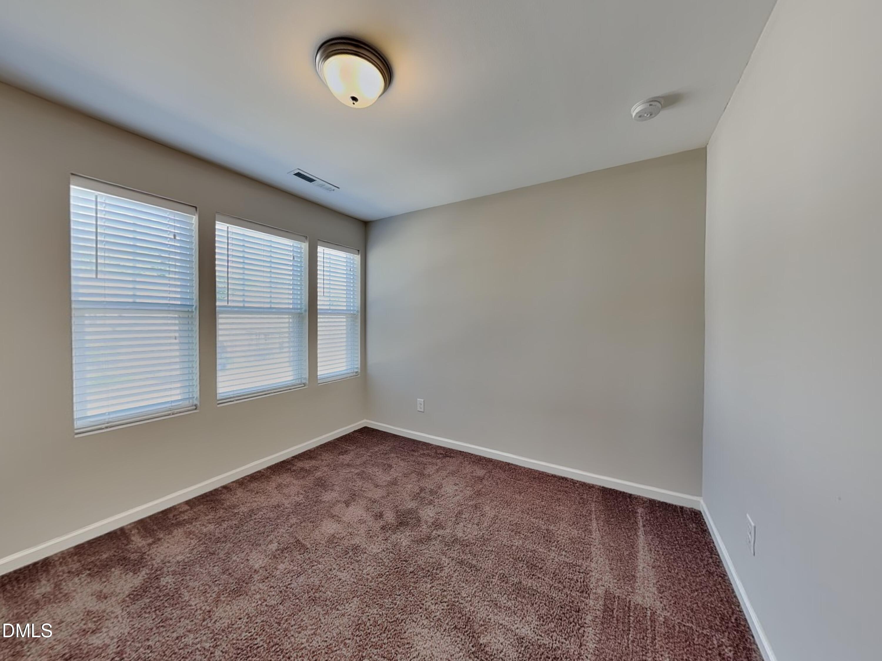 198 Outwater Ridge Drive Garner, NC 27529 - Photo 14 of 22 an empty room with a window