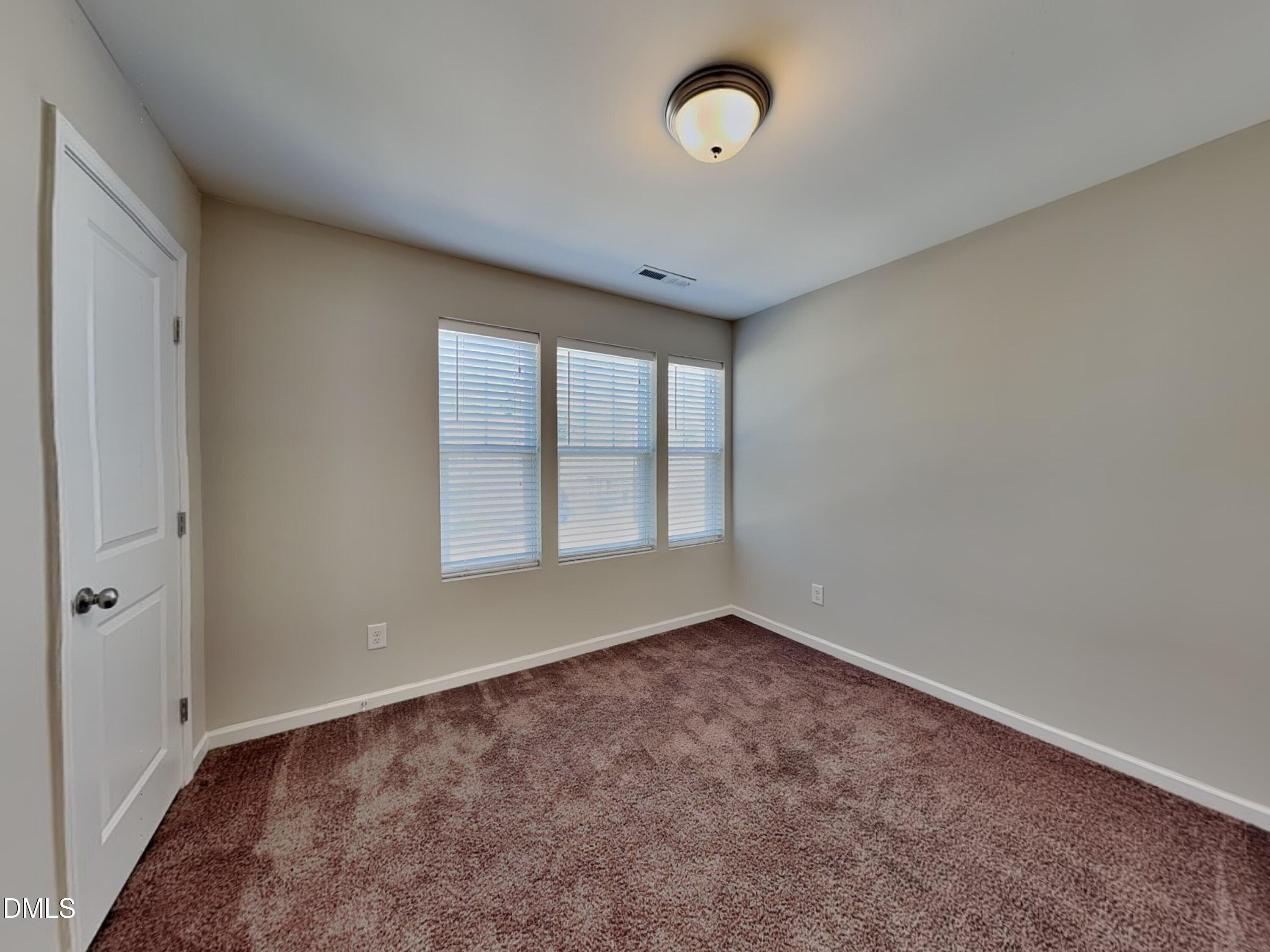 198 Outwater Ridge Drive Garner, NC 27529 - Photo 15 of 22 an empty room with a window