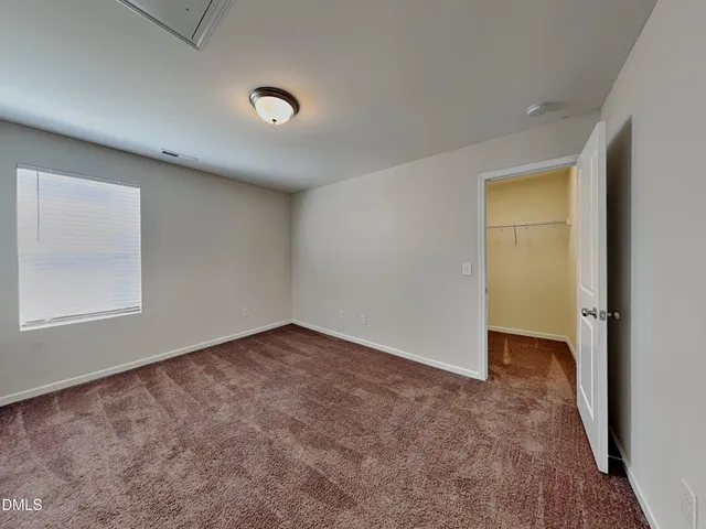 an empty room with a natural light