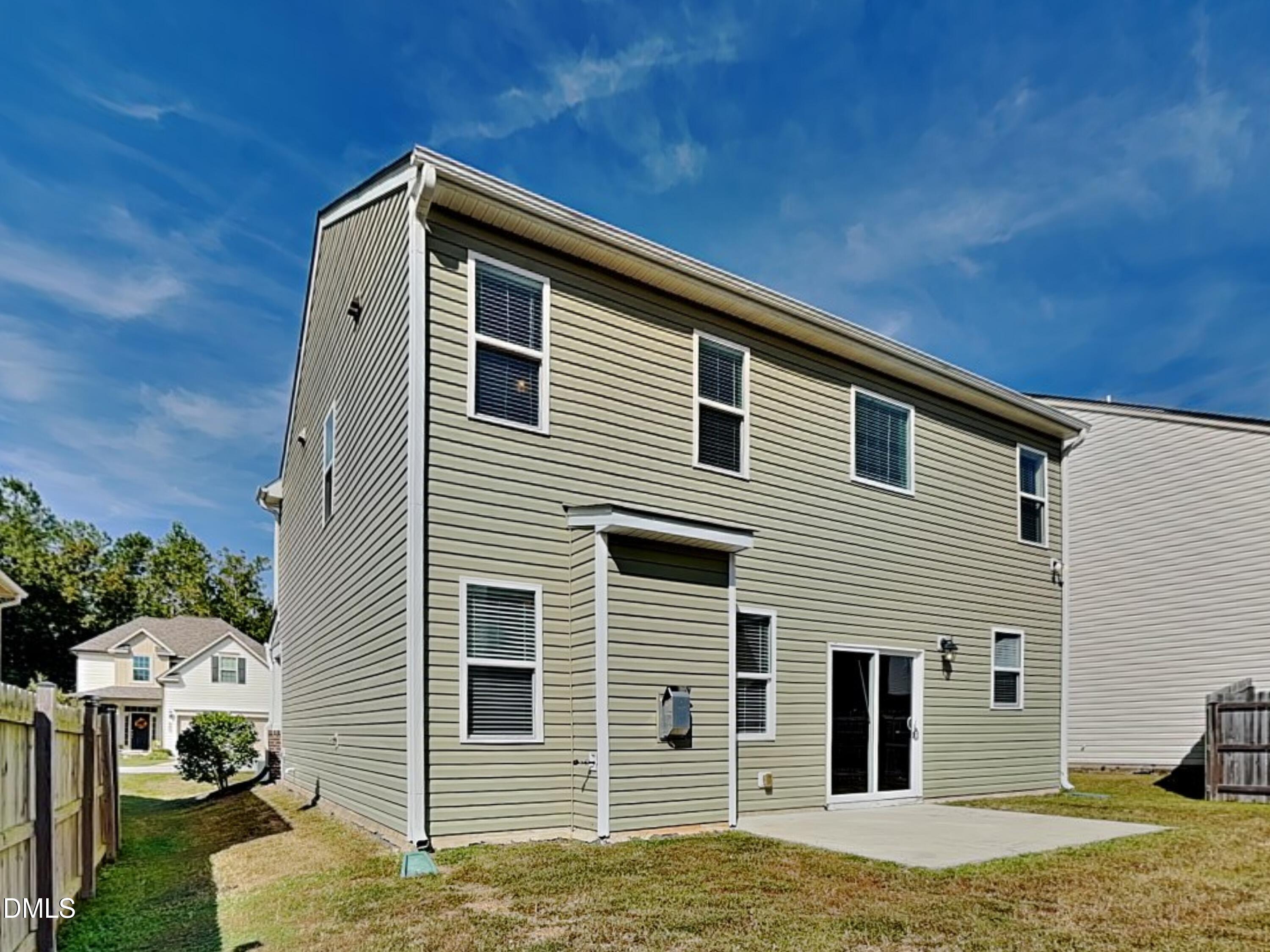 198 Outwater Ridge Drive Garner, NC 27529 - Photo 20 of 22 a front view of a house with a yard