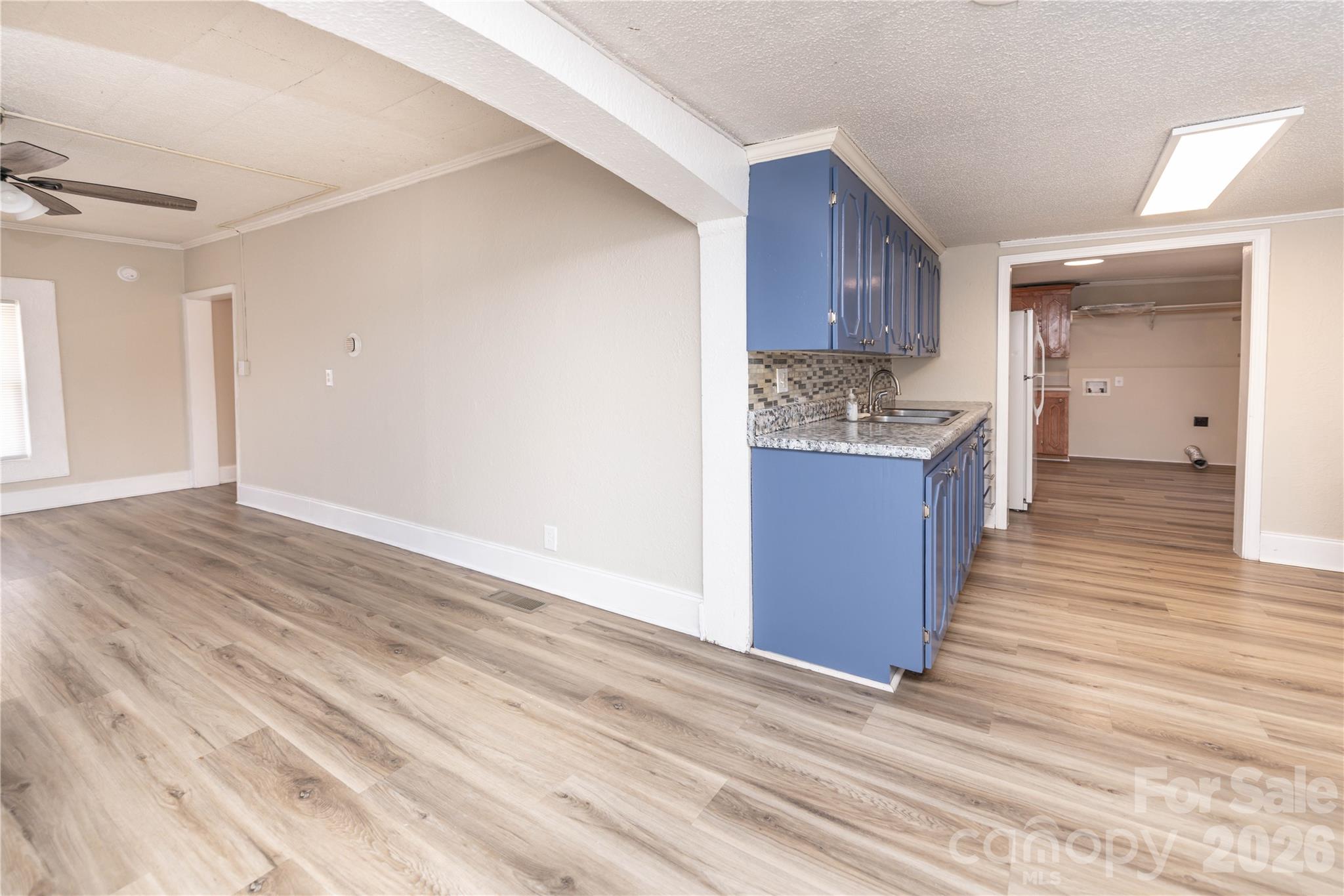 470 South Moose Road Mount Pleasant, NC 28124 - Photo 11 of 37 a view of a kitchen cabinets and wooden floor