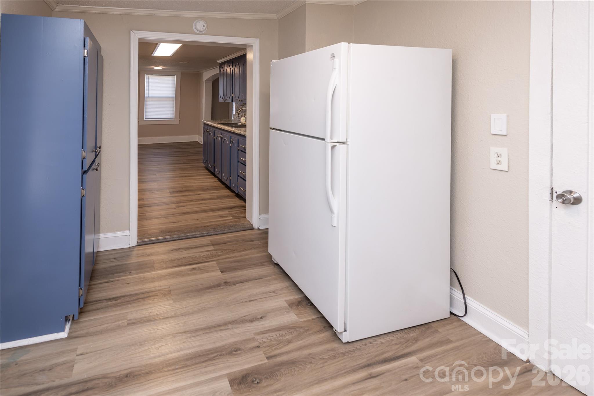 470 South Moose Road Mount Pleasant, NC 28124 - Photo 18 of 37 a view of a hallway with wooden floor and staircase