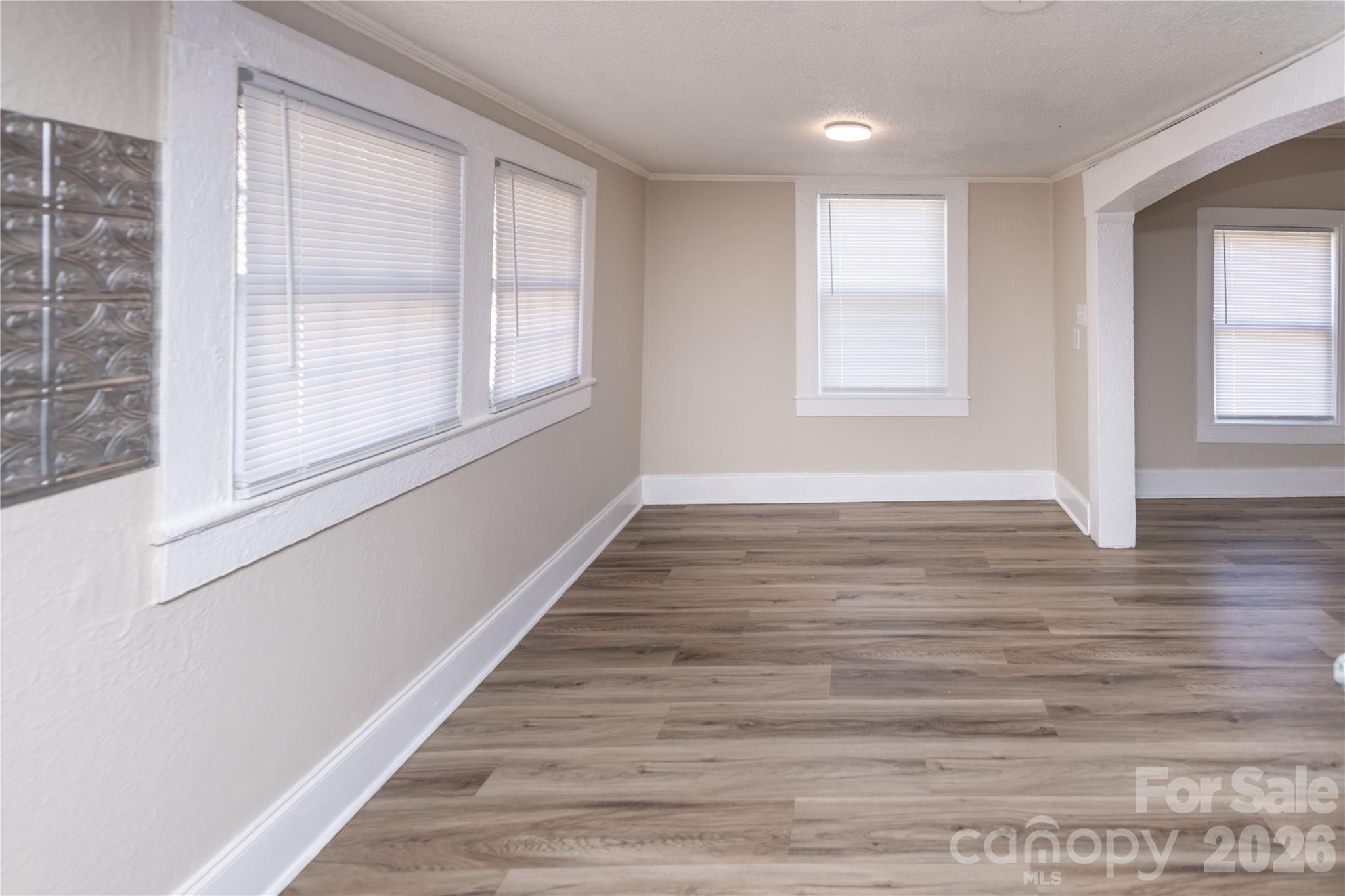 470 South Moose Road Mount Pleasant, NC 28124 - Photo 20 of 37 a view of an empty room with wooden floor and a window