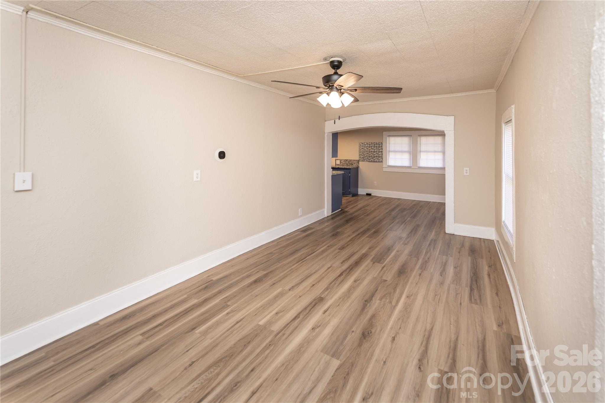 470 South Moose Road Mount Pleasant, NC 28124 - Photo 22 of 37 wooden floor in an empty room with a window