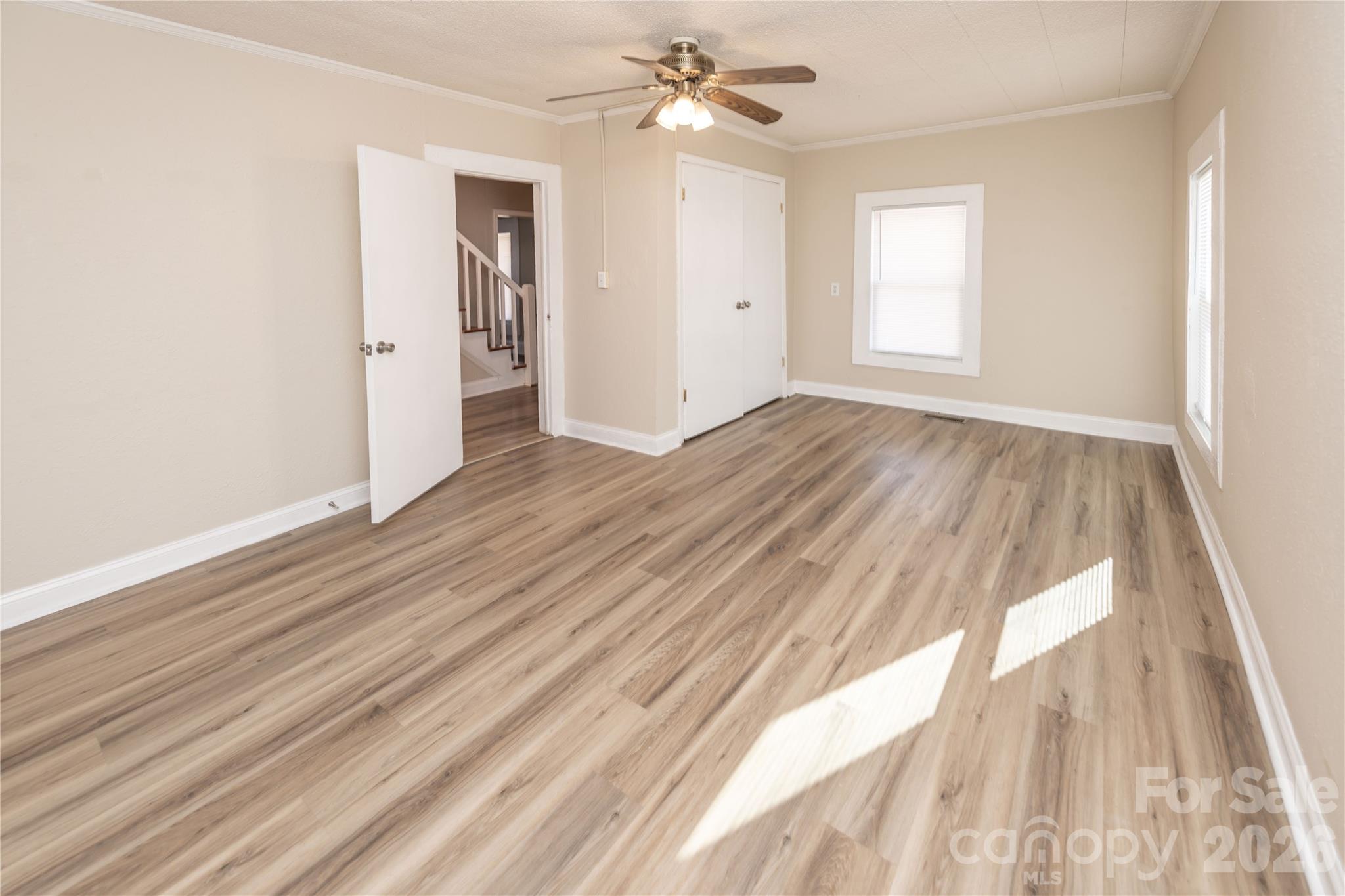 470 South Moose Road Mount Pleasant, NC 28124 - Photo 23 of 37 wooden floor in an empty room with a window