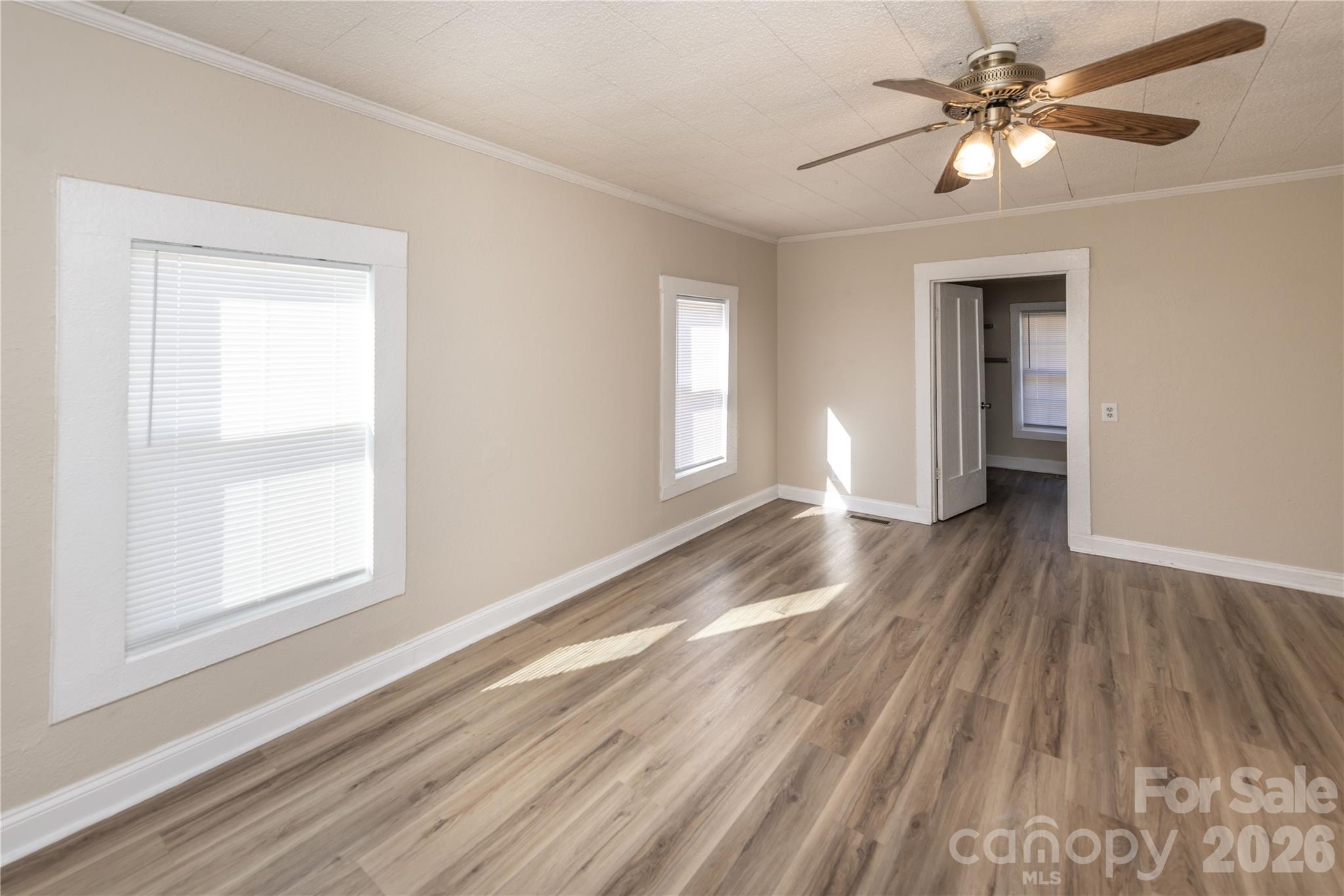 470 South Moose Road Mount Pleasant, NC 28124 - Photo 25 of 37 a view of empty room with a window and wooden floor