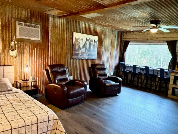 a room with furniture and wooden floor