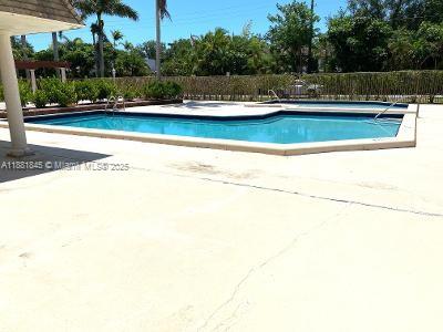 8601 Southwest 94th Street, Unit 227W Miami, FL 33156 - Photo 15 of 17 a view of a swimming pool