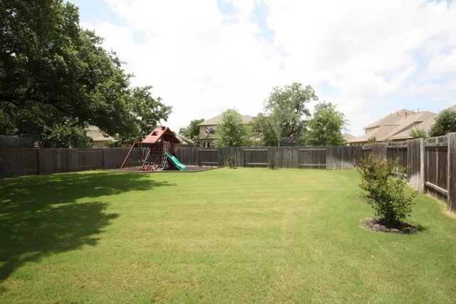 a view of a park with a slide