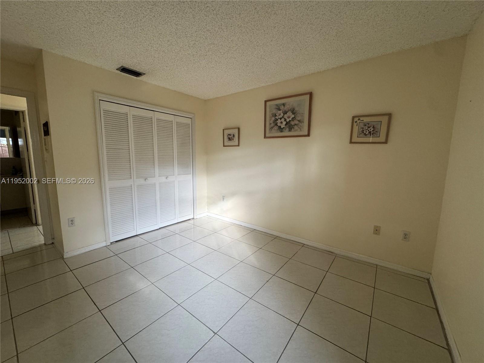14241 Southwest 36th Street Miami, FL 33175 - Photo 12 of 18 a view of an empty room and window