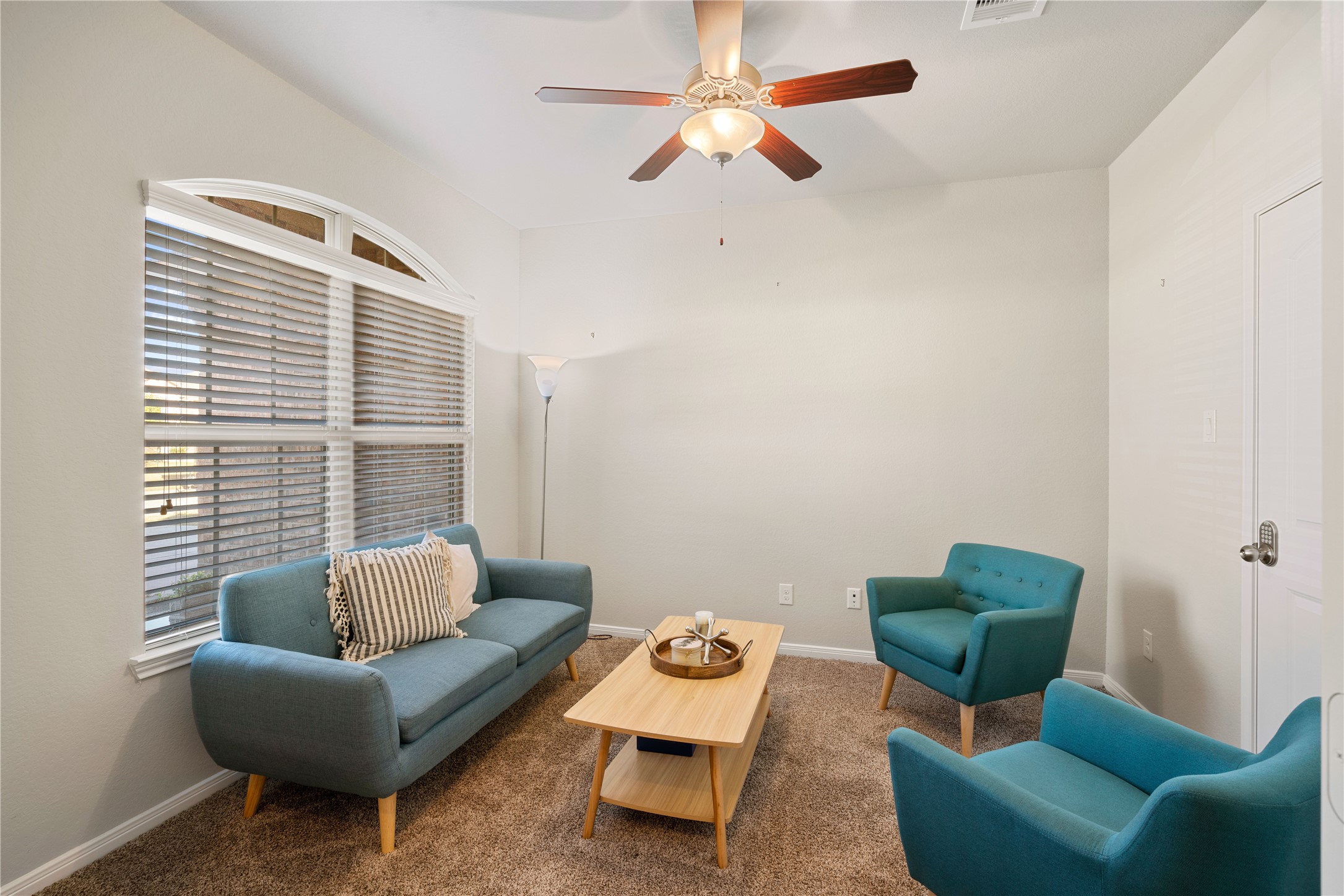 14300 Congaree Court Conroe, TX 77384 - Photo 20 of 31 a living room with furniture and a window