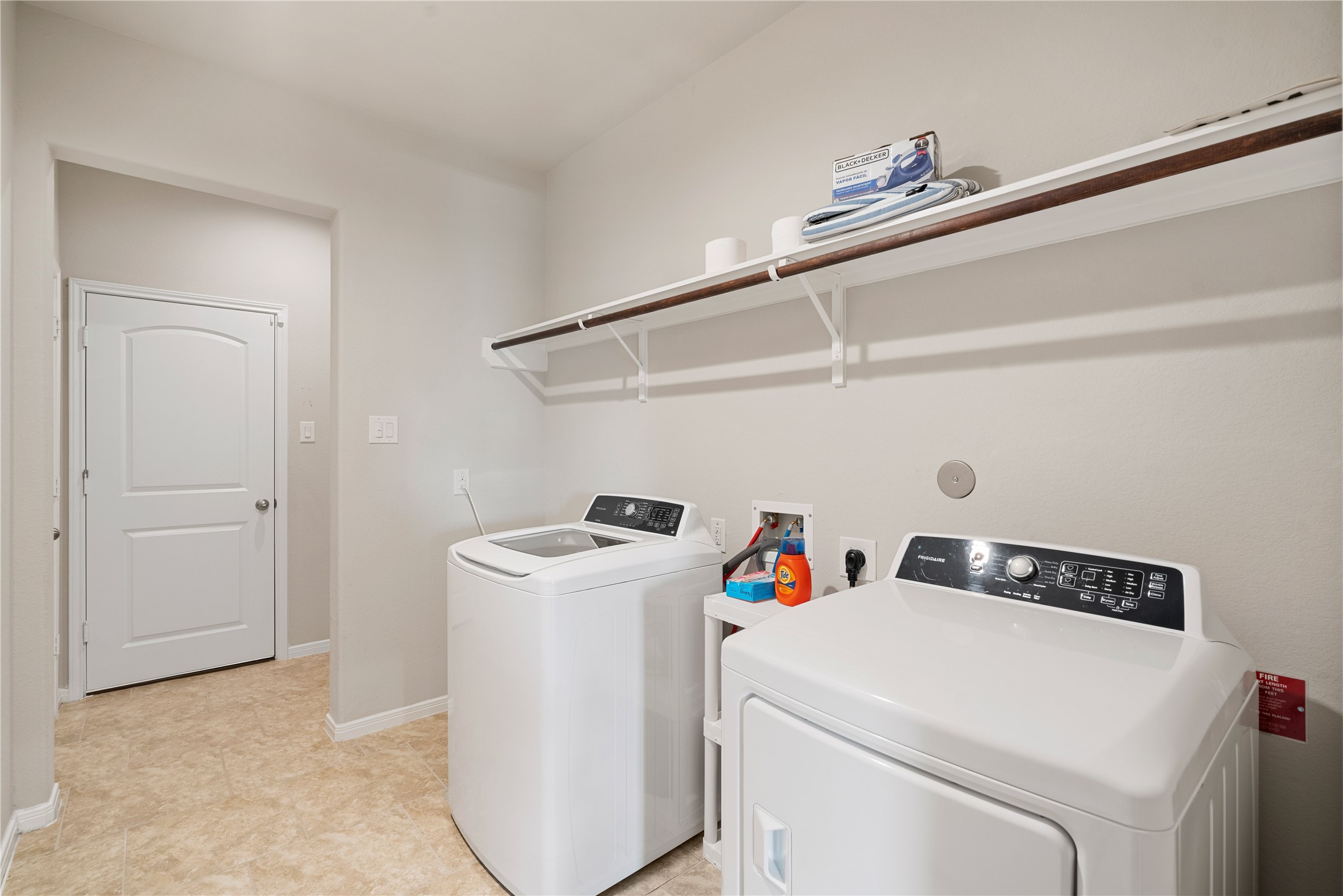 14300 Congaree Court Conroe, TX 77384 - Photo 25 of 31 a utility room with dryer and washer