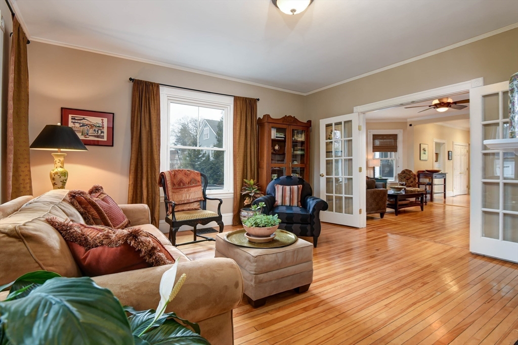 159 Warren Street Needham, MA 02492 - Photo 12 of 42 a living room with furniture and a large window