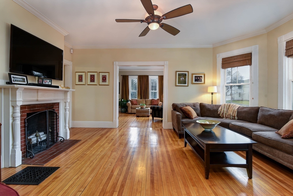 159 Warren Street Needham, MA 02492 - Photo 13 of 42 a living room with furniture fireplace and flat screen tv
