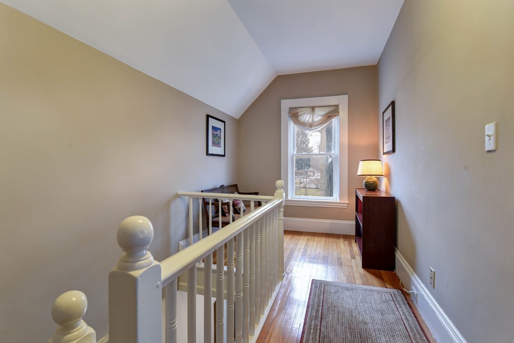 159 Warren Street Needham, MA 02492 - Photo 15 of 42 a view of entryway and hall with wooden floor