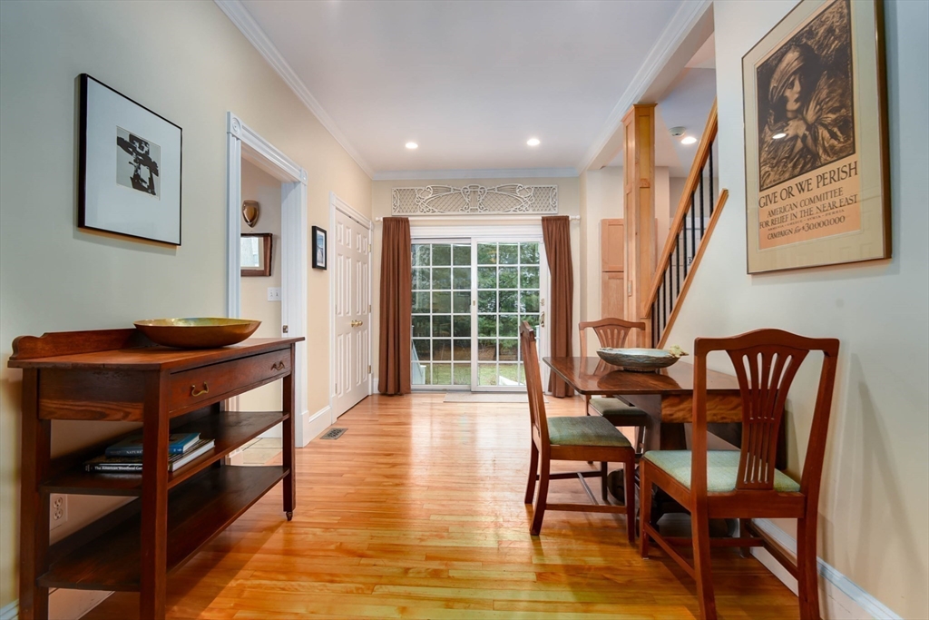 159 Warren Street Needham, MA 02492 - Photo 7 of 42 a view of a dining room with furniture window and wooden floor