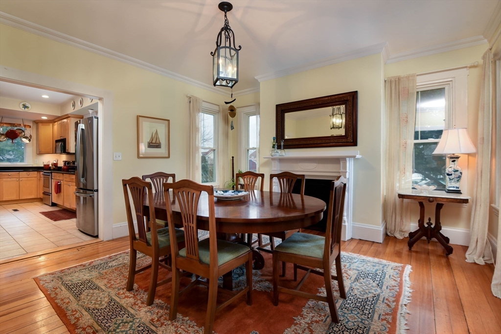159 Warren Street Needham, MA 02492 - Photo 10 of 42 a view of a dining room with furniture