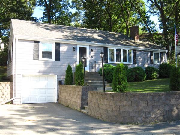 190 Florence Road Waltham, MA 02453 - Photo 1 of 1 a front view of a house with a yard and potted plants