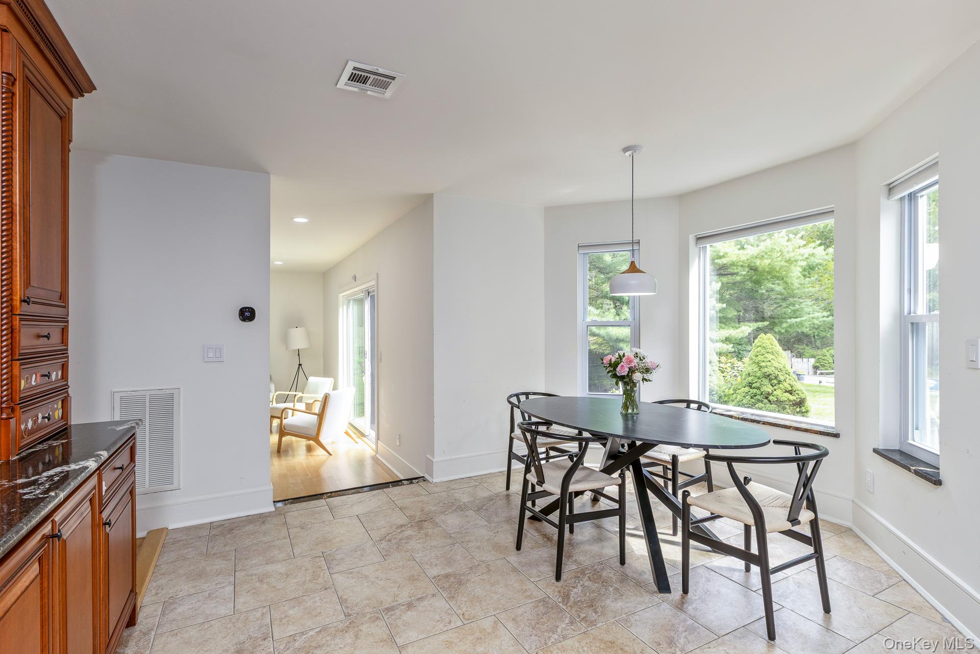 65 Mayfair Road Nesconset, NY 11767 - Photo 13 of 26 Sunlit Breakfast Area