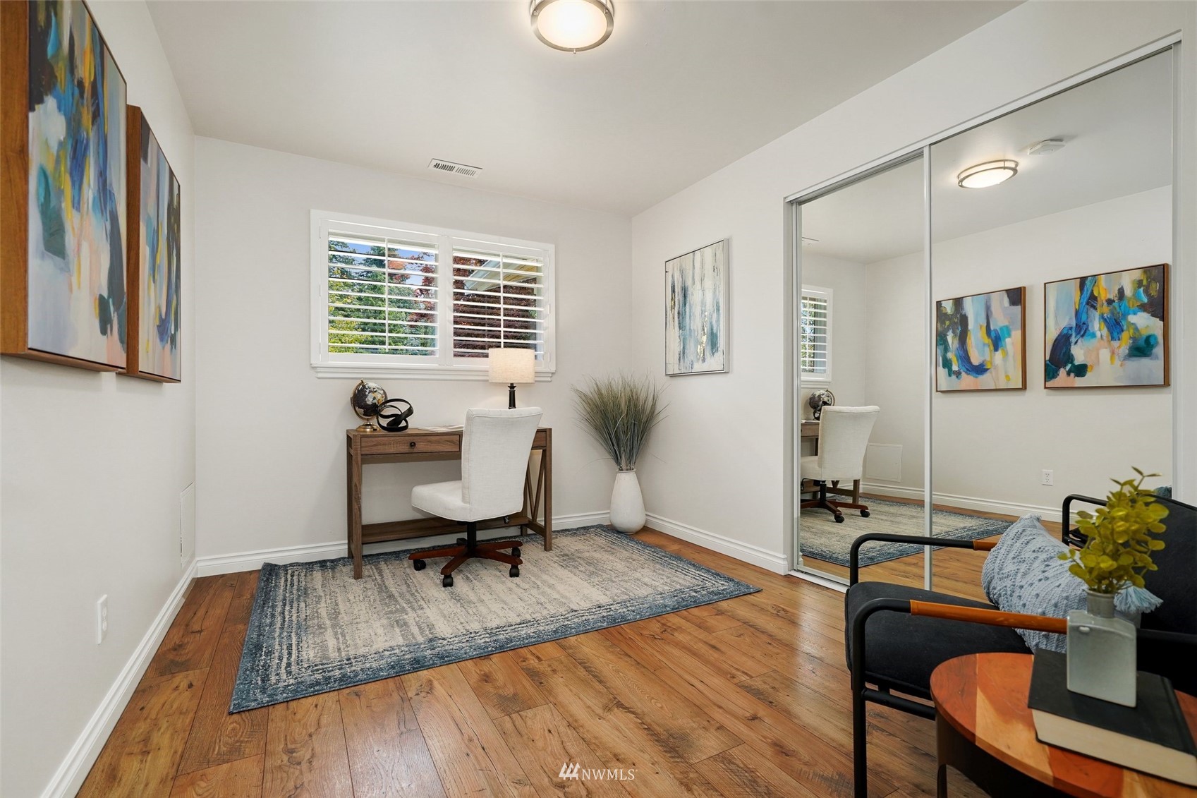 3007 Stafford Way Bothell, WA 98012 - Photo 17 of 32 a view of a livingroom with workspace and a window