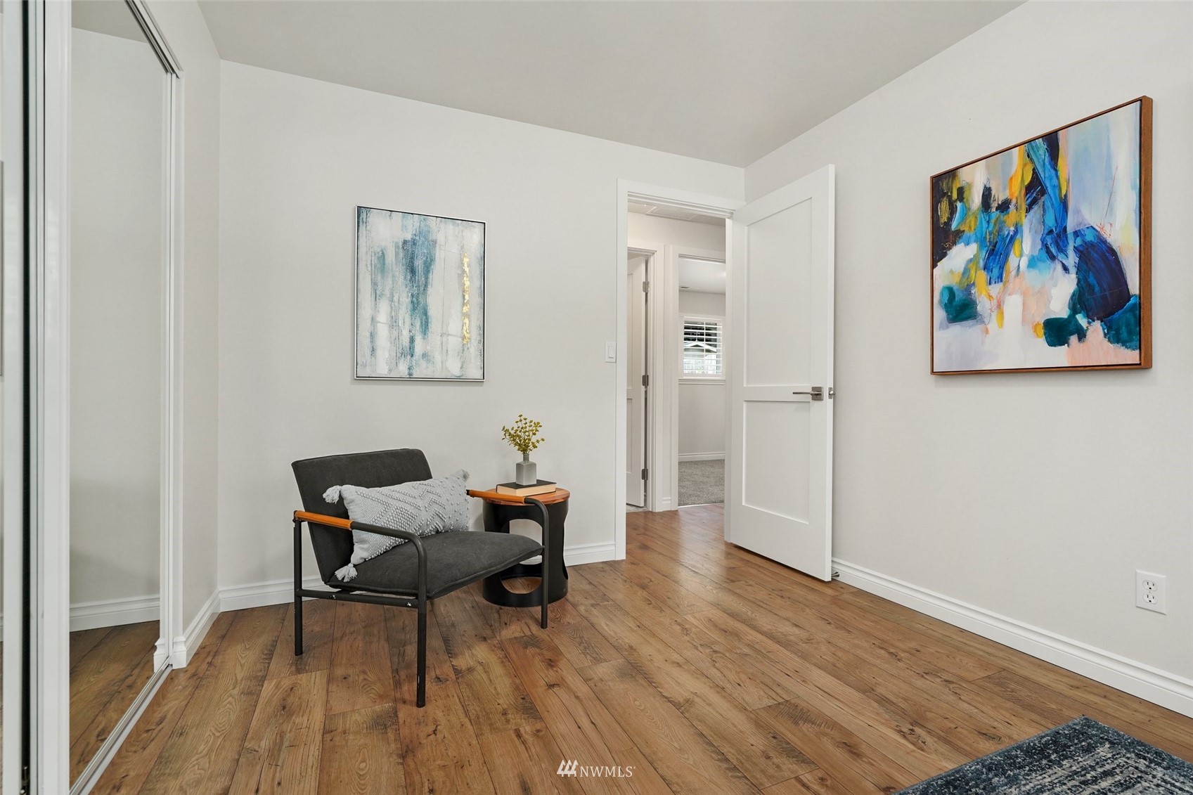 3007 Stafford Way Bothell, WA 98012 - Photo 18 of 32 a living room with furniture and wooden floor