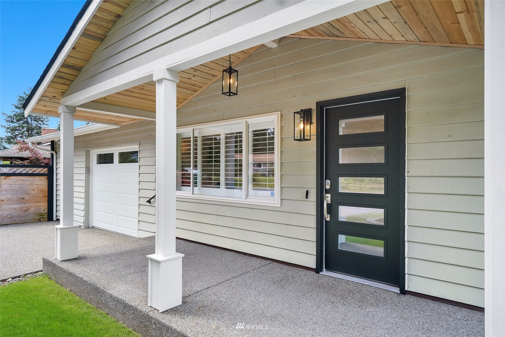 3007 Stafford Way Bothell, WA 98012 - Photo 4 of 32 a front view of a house with a yard