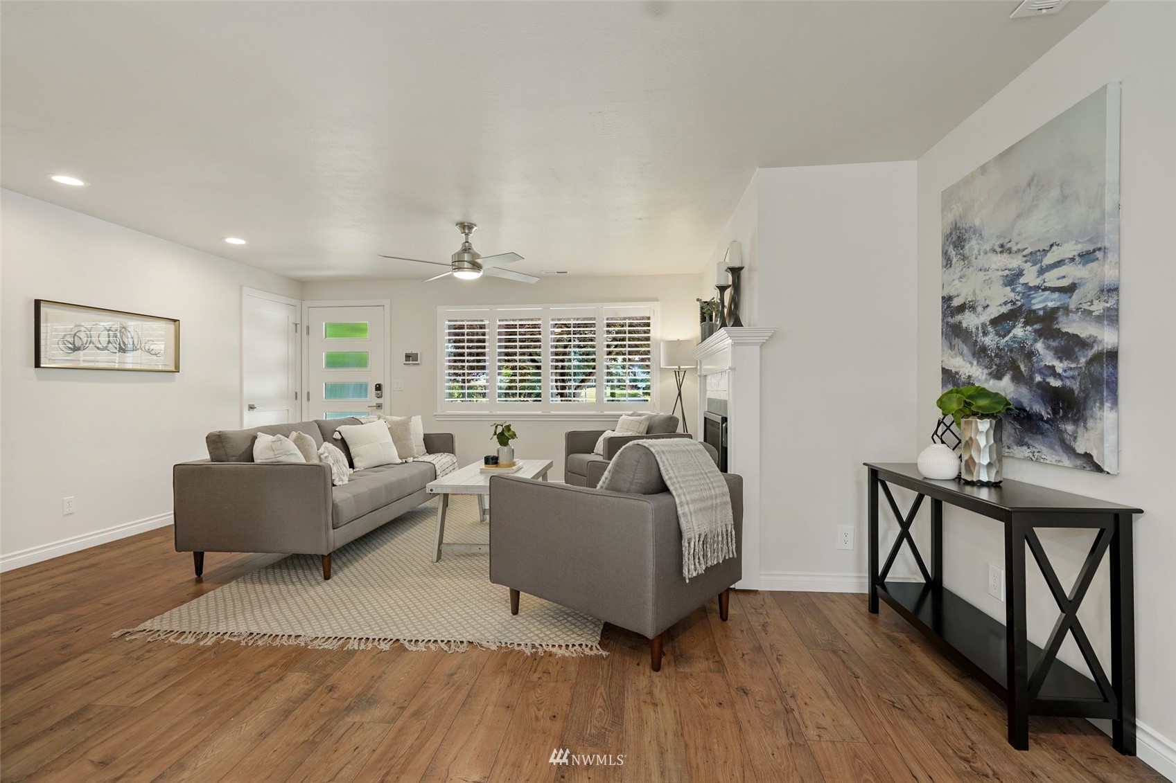 3007 Stafford Way Bothell, WA 98012 - Photo 5 of 32 a living room with furniture and a wooden floor