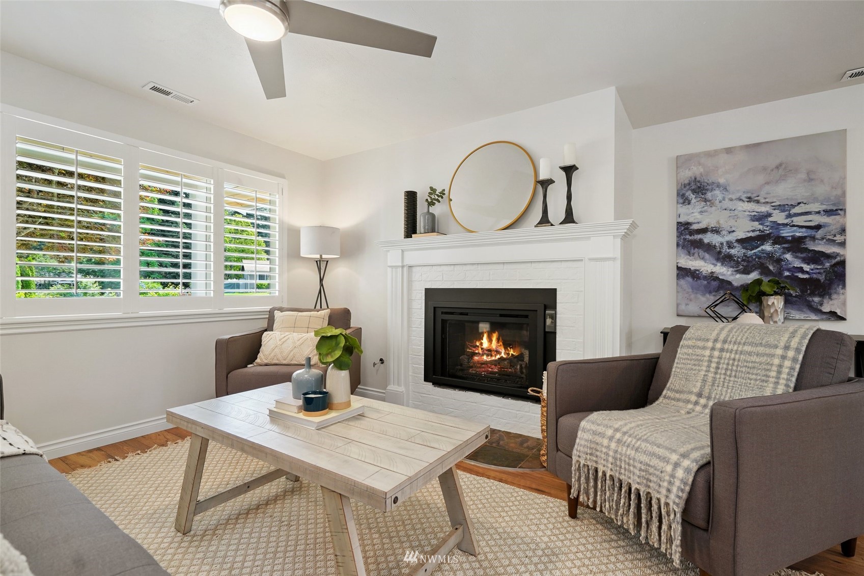 3007 Stafford Way Bothell, WA 98012 - Photo 6 of 32 a living room with furniture and a fireplace