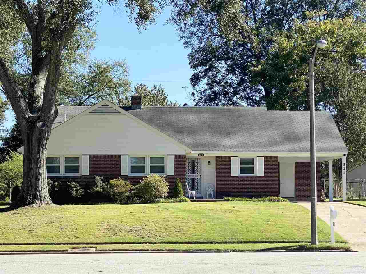 322 McElroy Road Memphis, TN 38120 - Photo 1 of 16 front view of a house with a yard