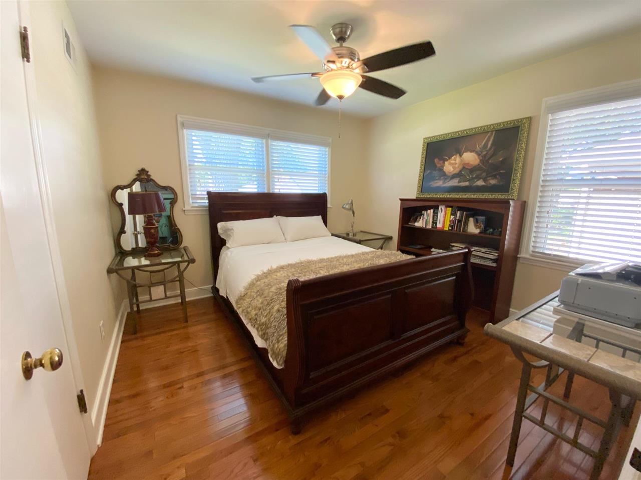 322 McElroy Road Memphis, TN 38120 - Photo 10 of 16 a bedroom with a bed and a tv