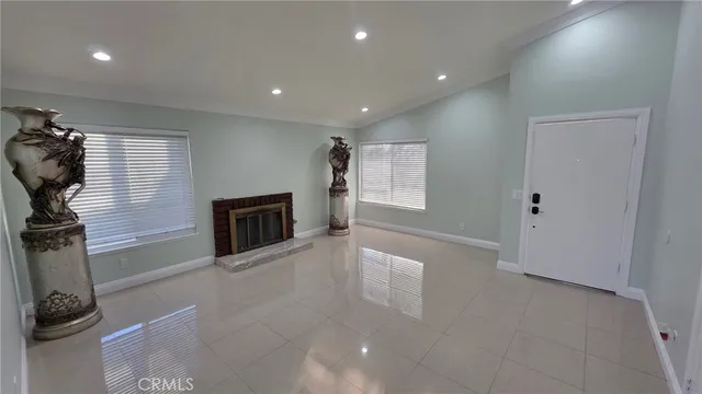 a view of a livingroom with a fireplace