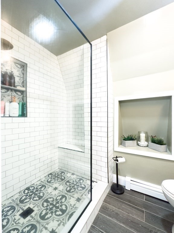 308 Acropolis Road Lowell, MA 01854 - Photo 15 of 21 a bathroom with a sink and a mirror