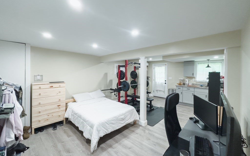 308 Acropolis Road Lowell, MA 01854 - Photo 17 of 21 a bedroom with a bed and a desk