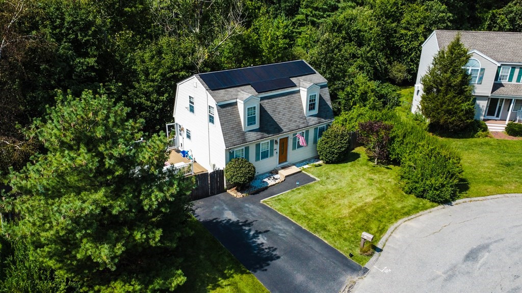 308 Acropolis Road Lowell, MA 01854 - Photo 3 of 21 an aerial view of a house with a yard
