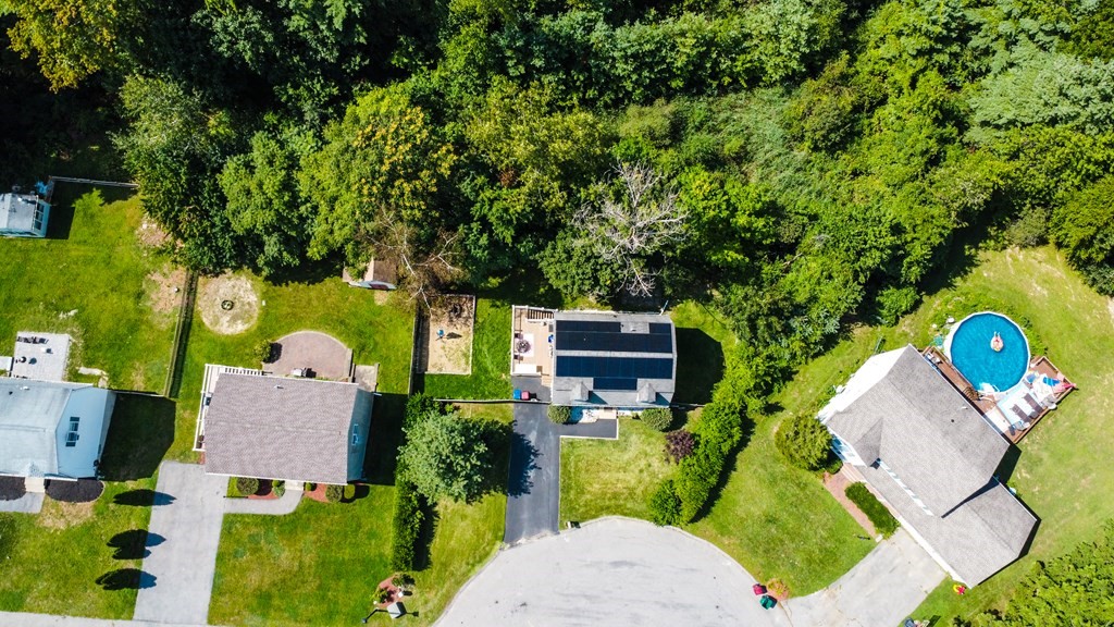 308 Acropolis Road Lowell, MA 01854 - Photo 4 of 21 an aerial view of a house with a yard basket ball court and outdoor seating
