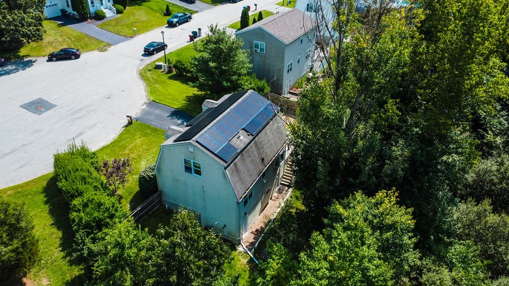 308 Acropolis Road Lowell, MA 01854 - Photo 5 of 21 an aerial view of a house with a yard