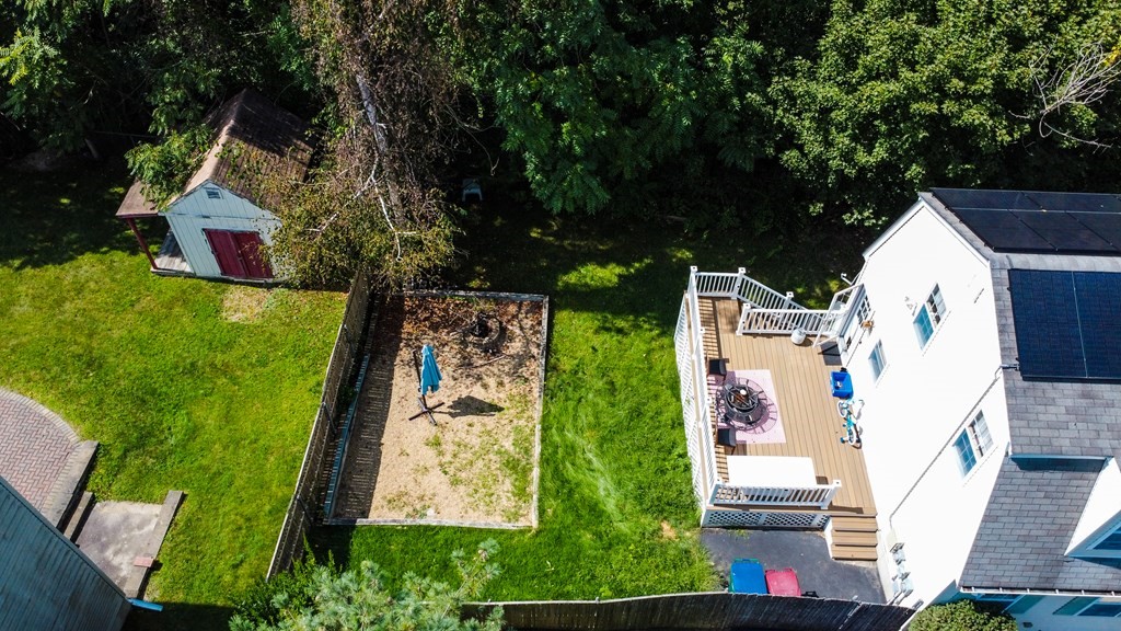 308 Acropolis Road Lowell, MA 01854 - Photo 6 of 21 an aerial view of residential house with outdoor space and trees all around