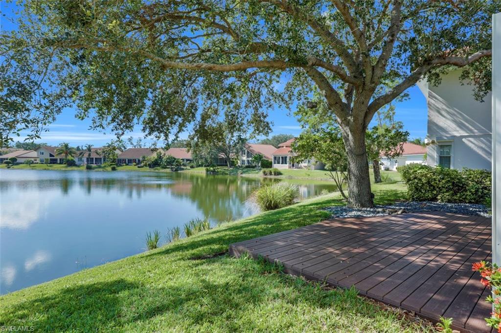 3578 Midas Place Naples, FL 34105 - Photo 17 of 21 a view of a backyard with a lake view