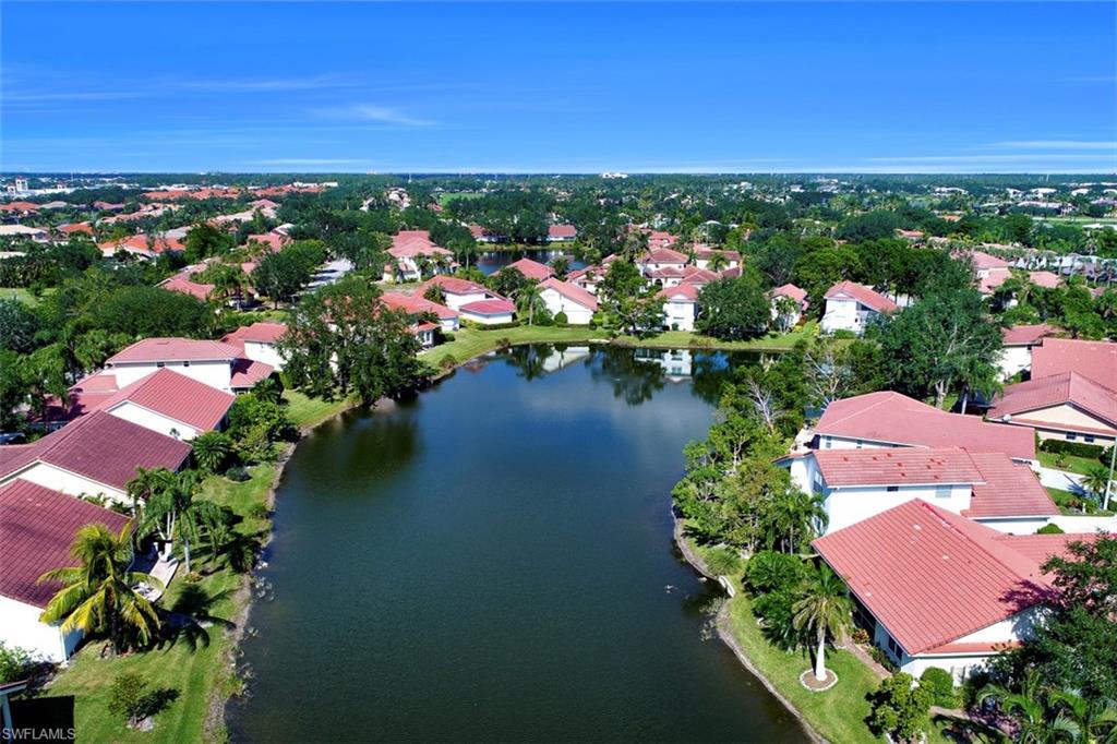 3578 Midas Place Naples, FL 34105 - Photo 19 of 21 an aerial view of residential houses with outdoor space and lake view